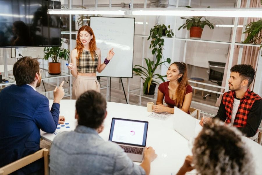 Woman facilitating a training in a training room