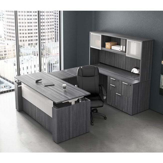 U-shaped executive suite with an adjustable-height stand-up desk.