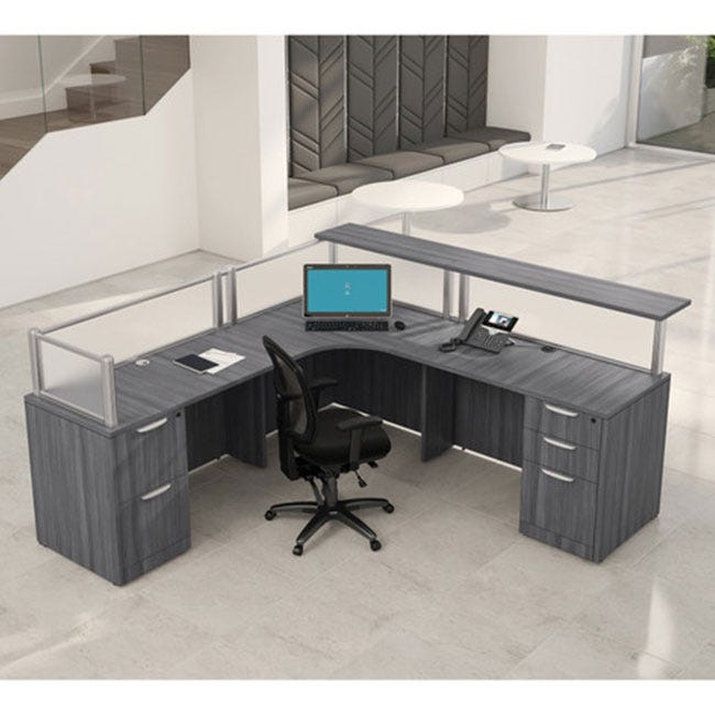 L-shaped reception desk with transaction shelf.