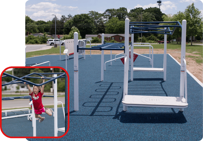 Worthington Direct Young girl swinging on monkey bars outdoors, enjoying playtime.
