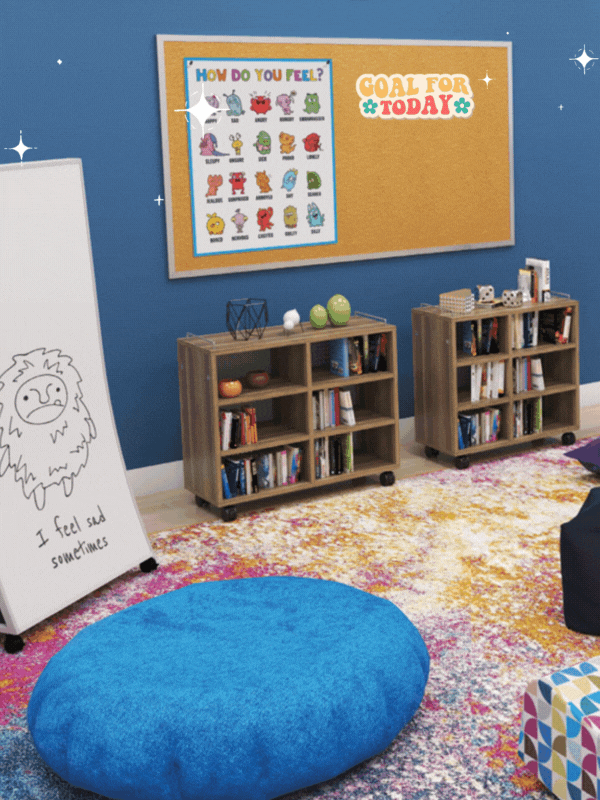 Colorful rug, blue cushion, cork bulletin board—a children's classroom with vibrant decor and engaging atmosphere.