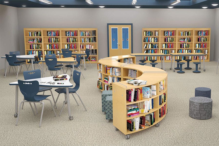 MooreCo educational library space with curved mobile bookcases, blue student chairs, collaborative tables, bookshelves, and flexible seating areas.