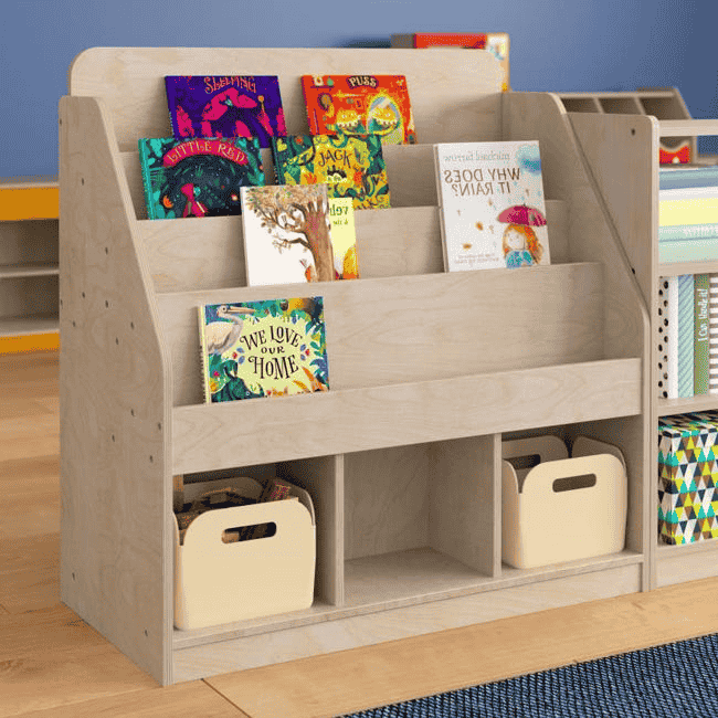 Child's book display inside an early childhood classroom, featuring a variety of young reader books arranged neatly.