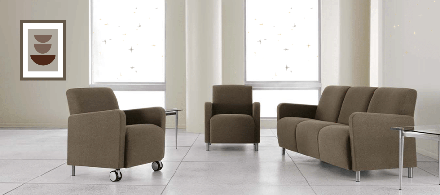 Waiting room showing a furniture suite for patients to sit. 