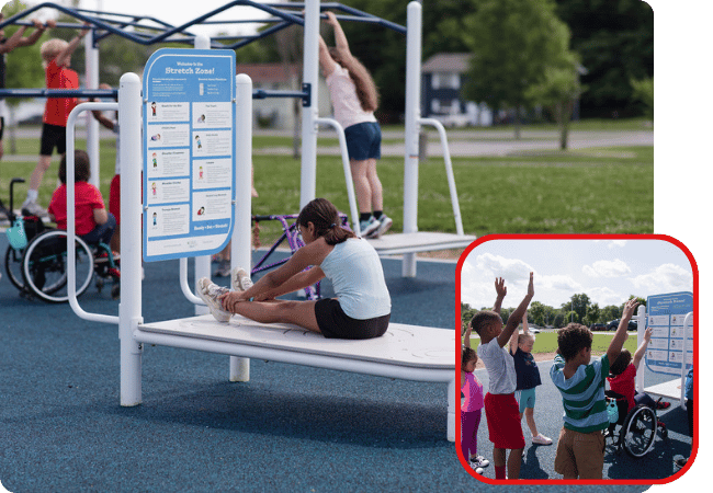 Worthington Direct Elementary students stretching on a playground equipment designed to promote flexibility and physical activity.